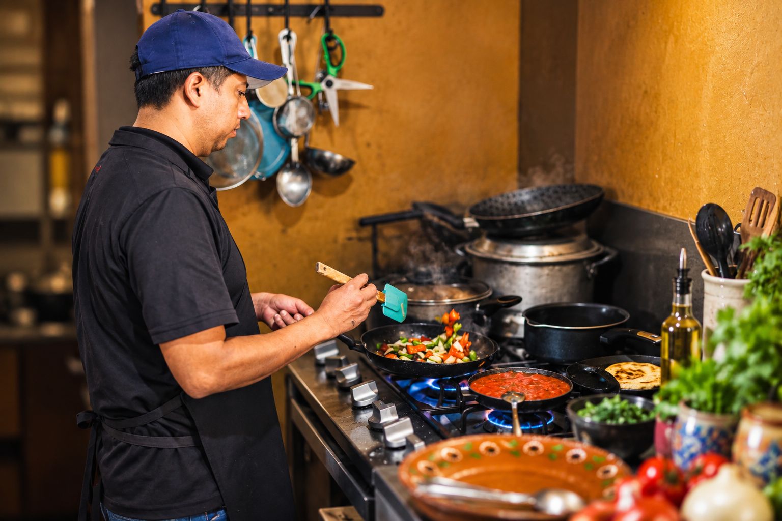 Cocina de María's al fuego, preparando cada platillo al momento
